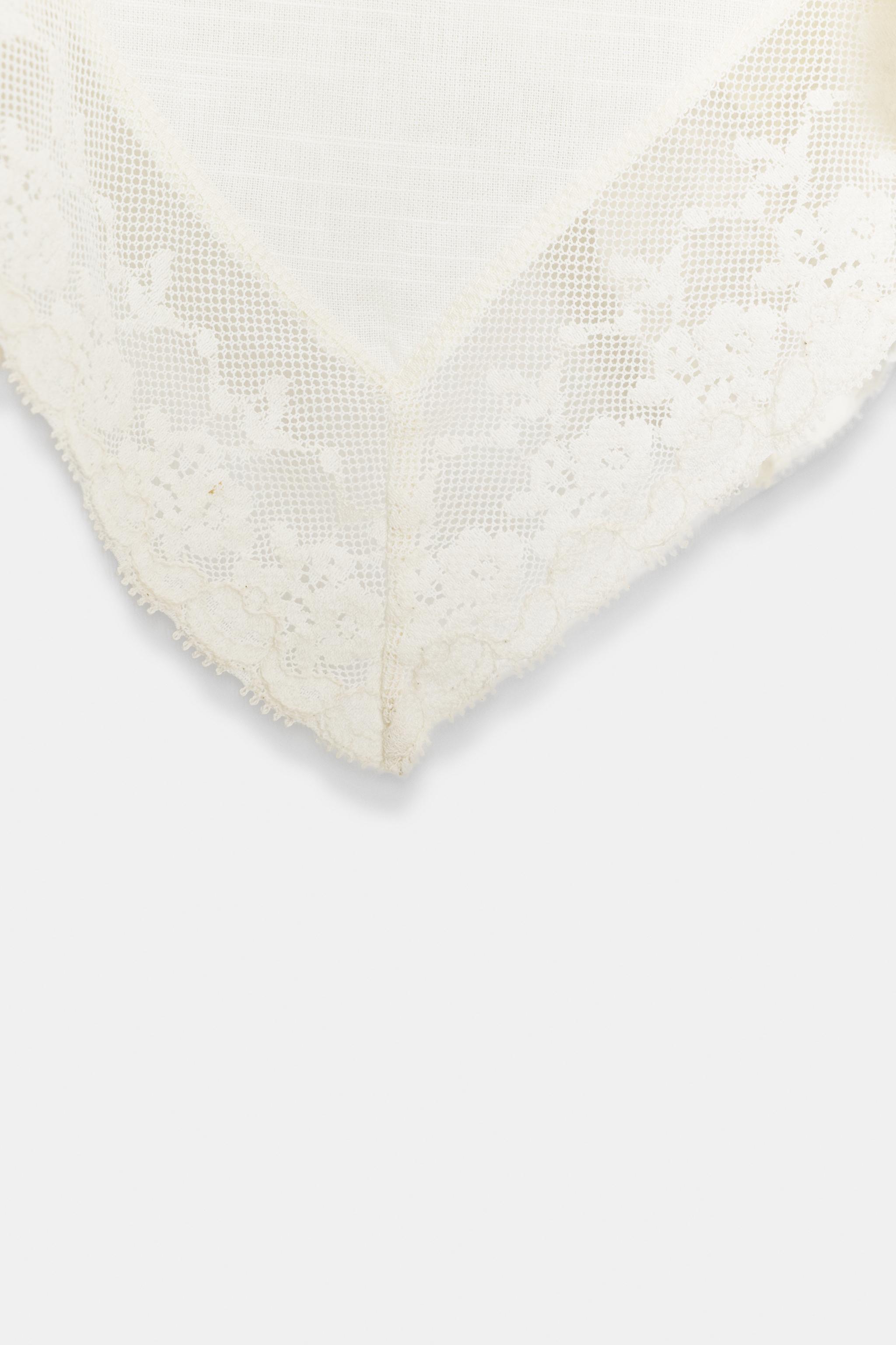 TOP CAPE EN DENTELLE